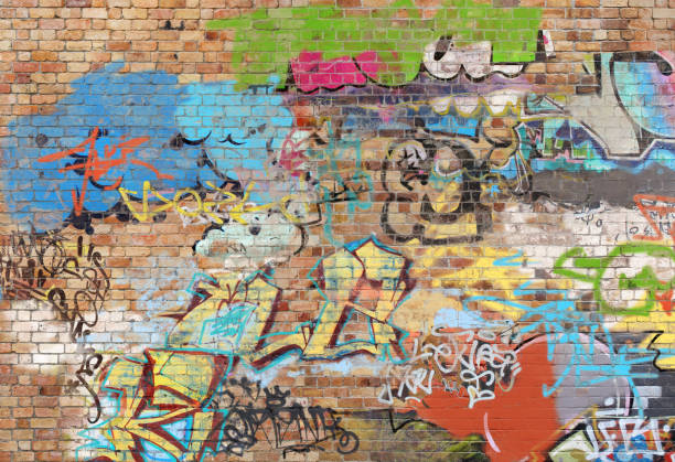 Graffiti on brick wall, composite of various images, layered and altered digitally so as to be non-identifiable. Graffiti on brick wall, composite of various images, layered and altered digitally so as to be non-identifiable. graffiti brick wall dirty wall stock illustrations