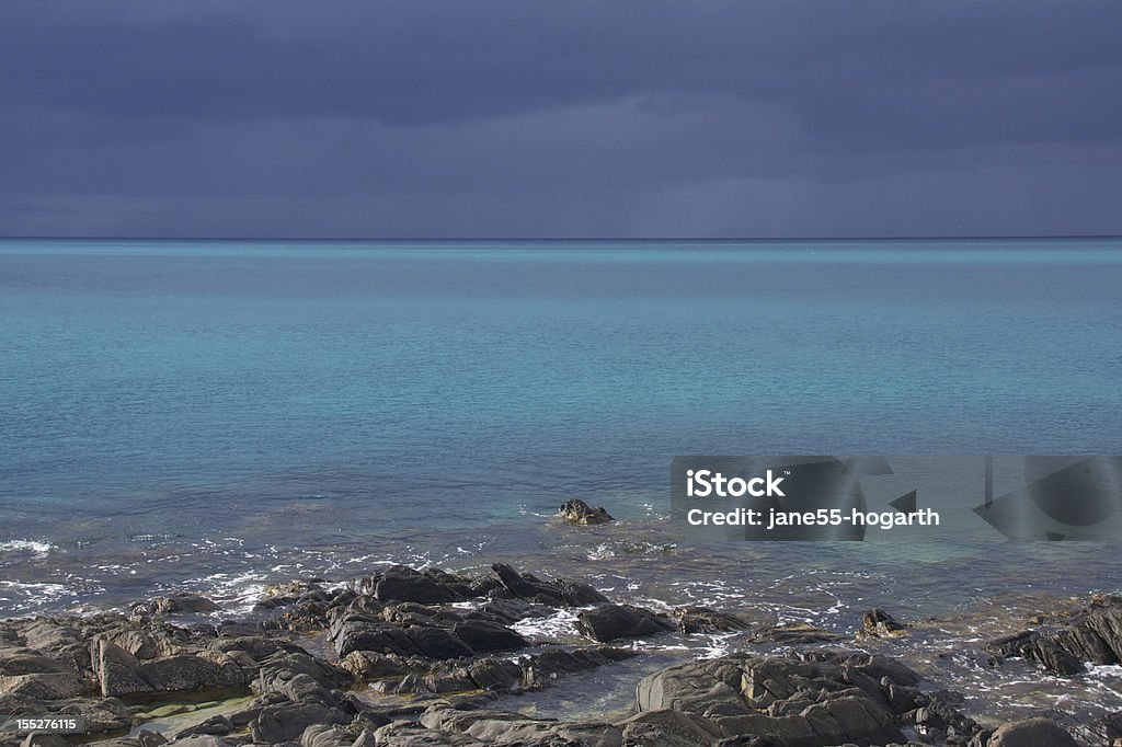 Rainclouds over Backstairs Passage Rainclouds moving in over the waters of Backstairs Passage between Kangaroo Island and the mainland of South Australia: 9th October 2012 Australia Stock Photo