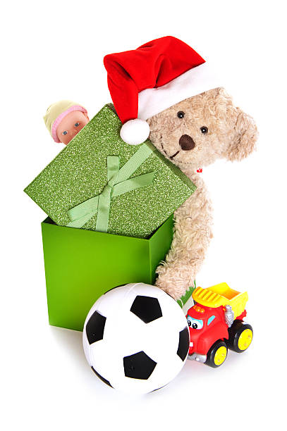 istock Playful Christmas Teddy Bear in Box with Toys 155276255