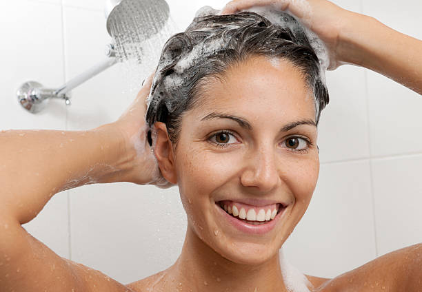 istock Woman washing her Hair with Shampoo (XXXL) 155276523