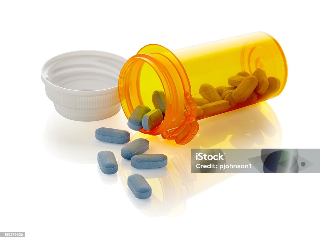 Blue Pills Jar of pills shot on white background, larger files include clipping path.  Professionally shot, color corrected, exported 16 bit color and retouched for maximum image quality. Aspirin Stock Photo