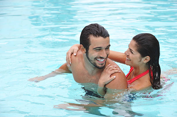 istock Attractive Couple Swimming 155276630