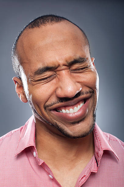 Portrait of a man suffering pain http://www.vela-photo.com/istock/studioportrait.jpg awful taste stock pictures, royalty-free photos & images