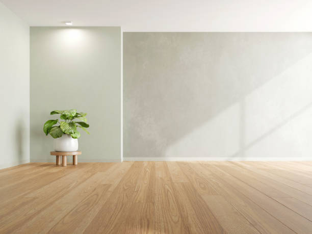 istock 3d rendering of empty room with wooden floor and concrete wall. 1552768193