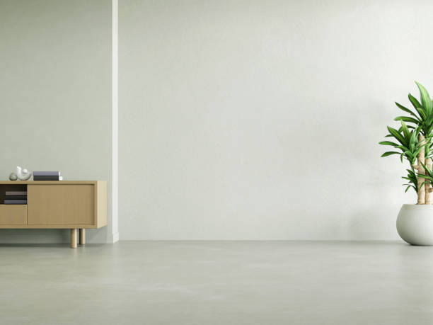 istock 3d rendering of empty room with white wall and concrete floor. 1552768194