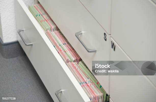 Patient Documents Medical Record Stock Photo - Download Image Now - Filing Cabinet, Medical Clinic, File Folder