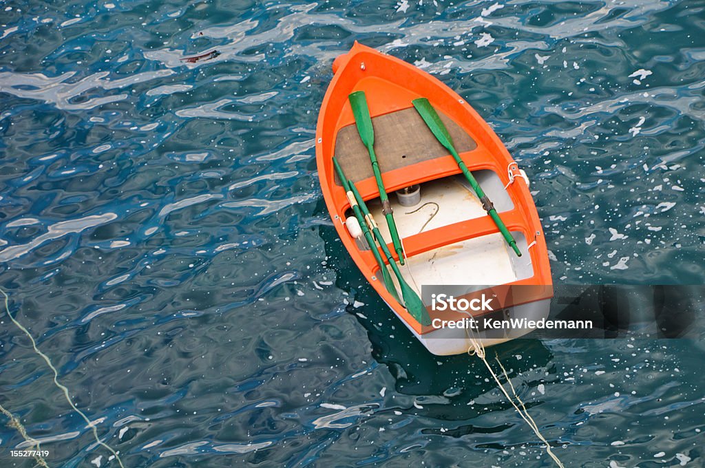 Petit Orange Row bateau - Photo de Bateau à rames libre de droits