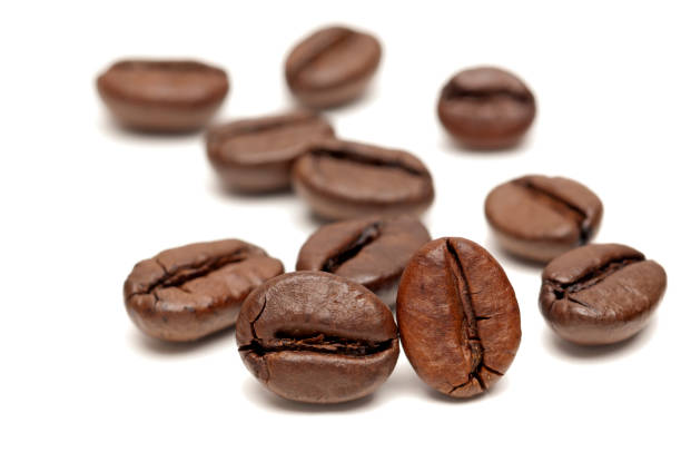 istock Macro of Coffee Beans on white background 155277747
