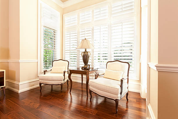 Bedroom Sitting Area Sitting chairs and table in a master bedroom in an estate home. shutter stock pictures, royalty-free photos & images
