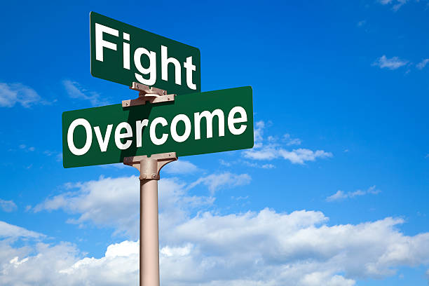 istock Fight Overcome Street Intersection Sign 155277994