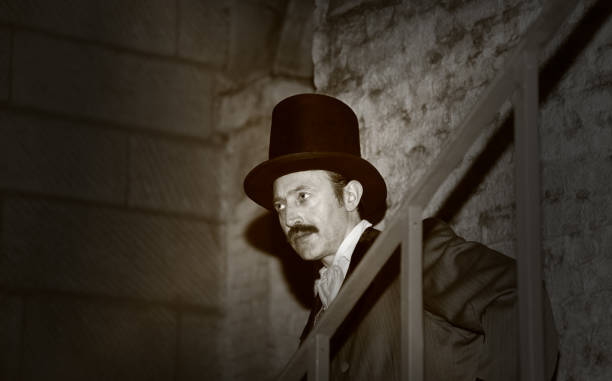 istock monochrome evil victorian man  with top hat in cellar 155278061
