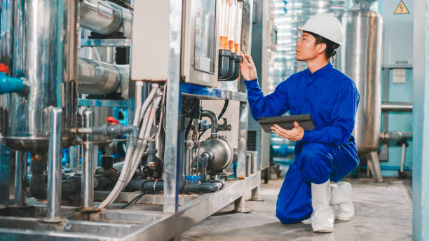 istock Maintenance engineer working in the water factory 1552781536