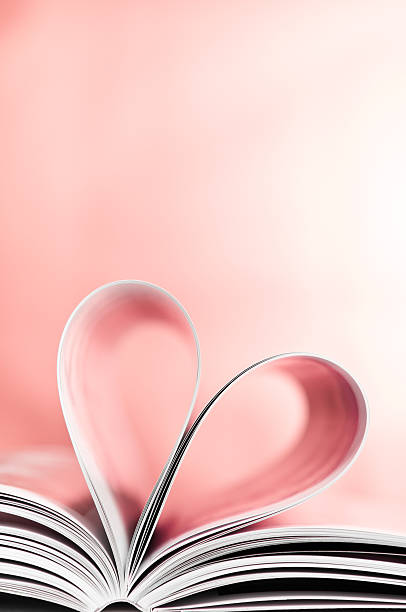 istock Love to reading books, pages folded into red heart shape 155278338