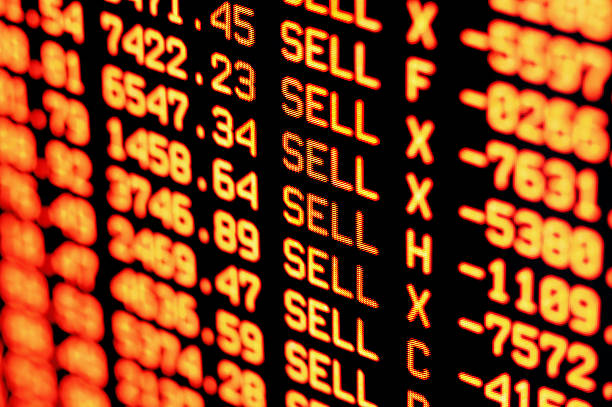 stock market crash sell-off red finance numbers Trading screen financial data in red. Selective focus. Focus is appx central.  stock market crash photos stock pictures, royalty-free photos & images