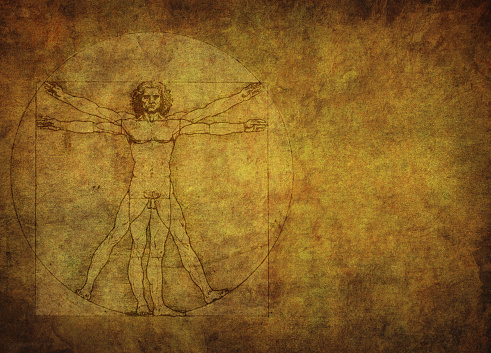 Vitruvian man on old textured brown and gold background. Original drawing from 1492 by Leonardo Da Vinci.