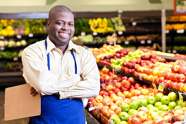 istock Happy manager at a grocery store produce area 155278639