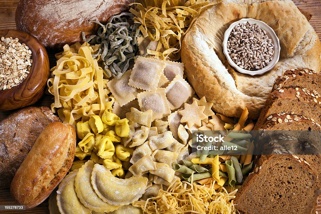 Pasta and Bread Baked goods and Pasta Still Life.  Carbohydrate - Food Type Stock Photo