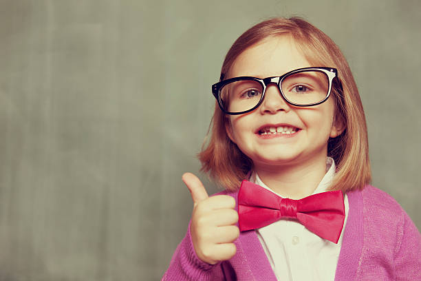 学習は楽しい - thumbs up child success winning ストックフォトと画像