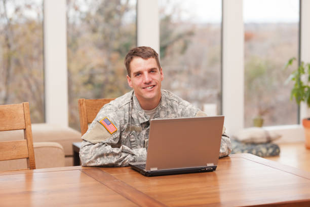 istock American soldier with laptop 155279675