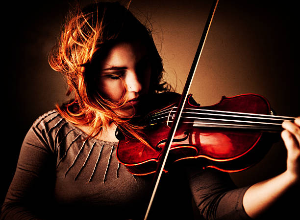 istock Woman Playing the Violin 155279778