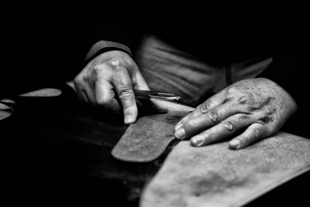 Hand sewing  cobbler stock pictures, royalty-free photos & images