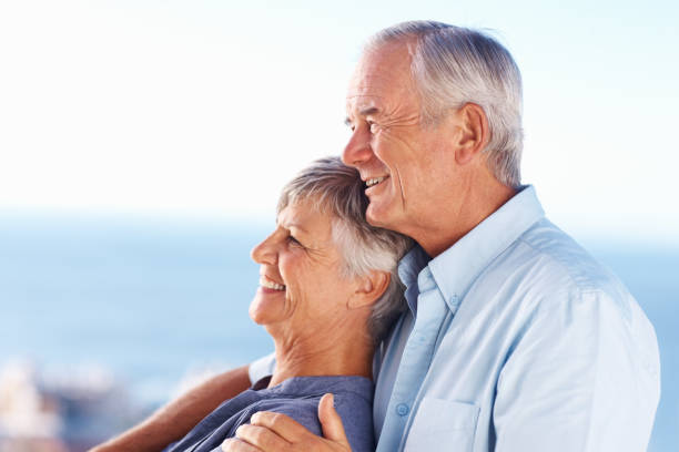 istock Romantic couple smiling outdoors 155280008