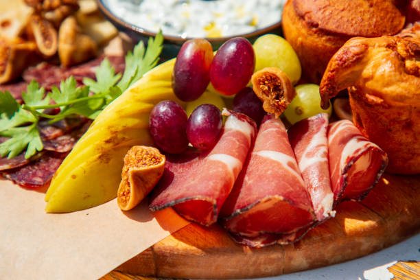 istock Close-up on prosciutto on delicious appetizer plate served in fine dining 1552801523