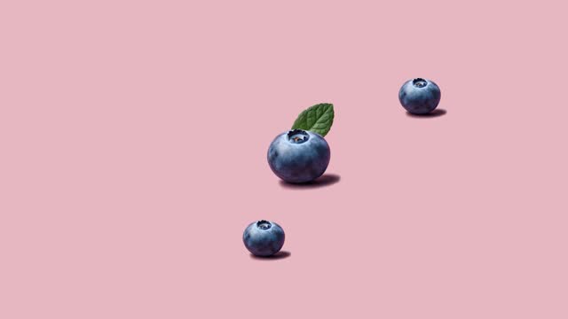 Stop motion Blueberry appear and disappear on pastel background.