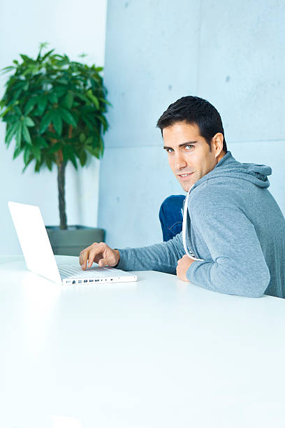 istock Man working at home with laptop 155282125