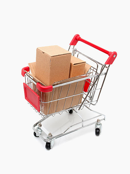 istock Shopping cart full of boxes isolated on white background 155282741
