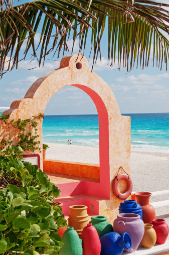 Colorful Mexican pottery and architecture on the beach in Cancun.