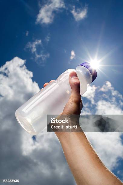 Water Bottle Stock Photo - Download Image Now - Arms Raised, Blue, Bottle