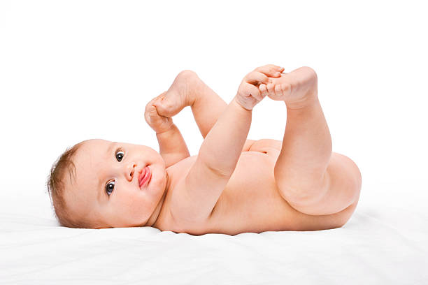 Adorable baby playing stock photo