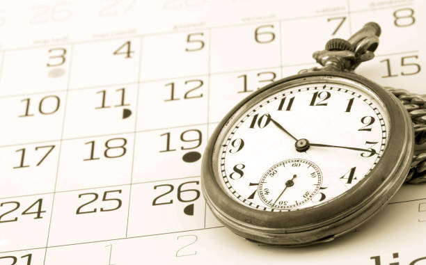 Calendar and  clock on sepia