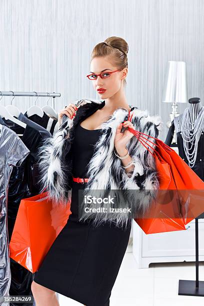 Posh Woman In Boutique Stock Photo - Download Image Now - 20-24 Years, 20-29 Years, Adult