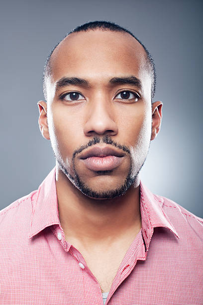 istock Portrait of a serious man 155284284