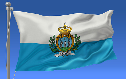 San Marino flag waving on the flagpole on a sky background