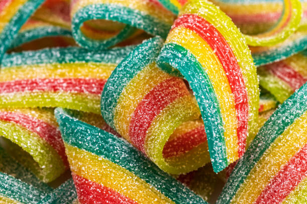 istock Rainbow sour jelly candies strips in sugar sprinkle 1552847274