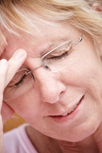 istock Mature woman with headache 155284846
