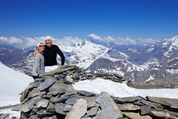 istock Couple at the top of a Mountain 155285263
