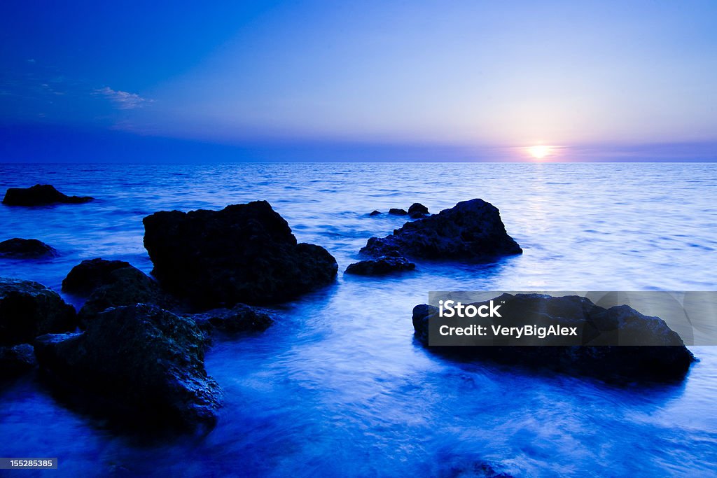 海に沈む夕日 - 夕暮れのロイヤリティフリーストックフォト