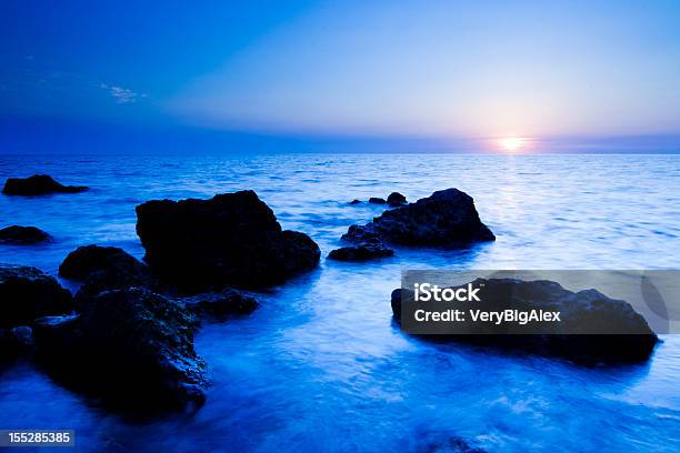 Zachód Słońca Nad Morze - zdjęcia stockowe i więcej obrazów Bezchmurne niebo - Bezchmurne niebo, Niebieski, Pejzaże