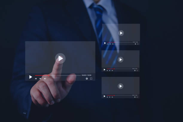 istock Businessman watching live stream online live streaming video on internet concept digital live stream multimedia player 1552854107