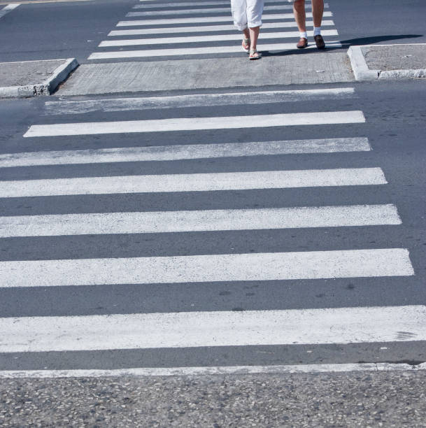 istock two legs walking on pedestrian crossing 155285489