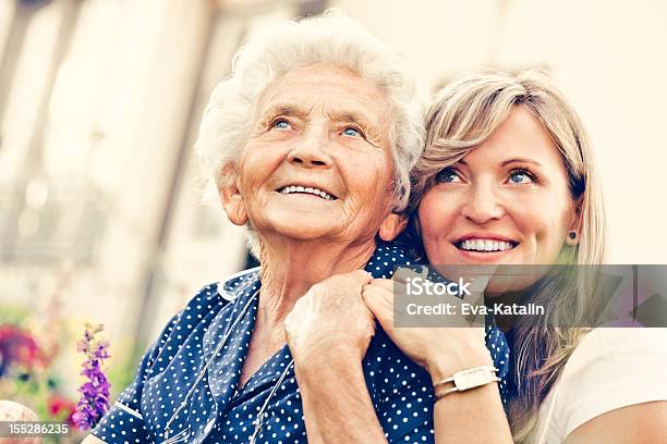 Two Beautiful Women Stock Photo - Download Image Now - 30-34 Years, 30-39 Years, 80-89 Years