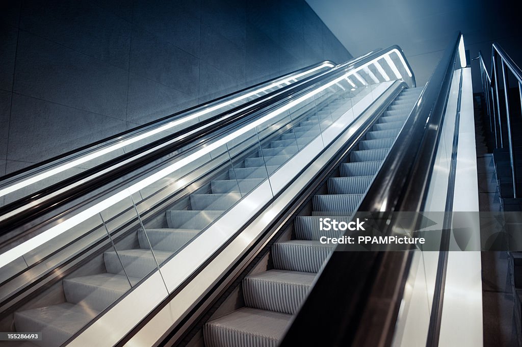 Escalator in Building empty escalator.  At The Bottom Of Stock Photo