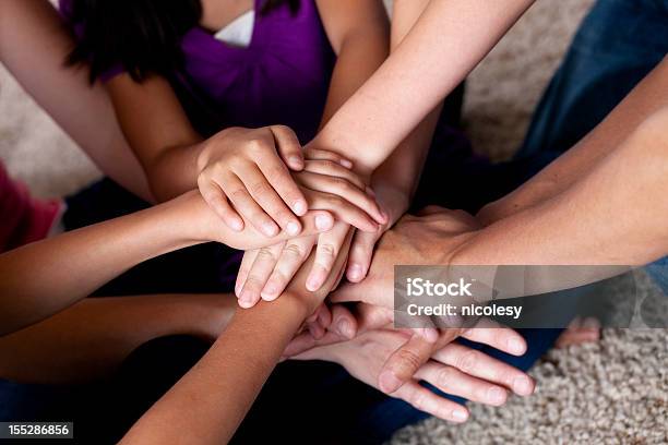 Family Teamwork Stock Photo - Download Image Now - Adult, Asian and Indian Ethnicities, Carpet - Decor
