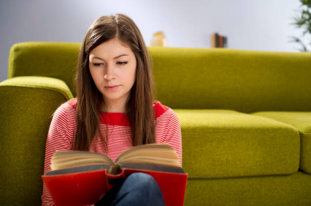 istock teenager reading a book 155286872