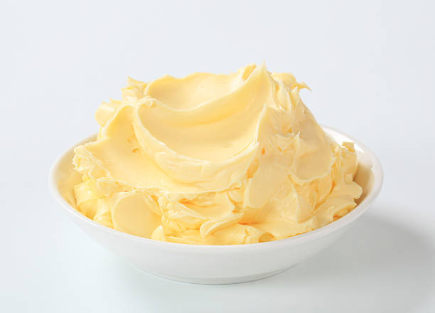 Bowl of homemade butter stock photo