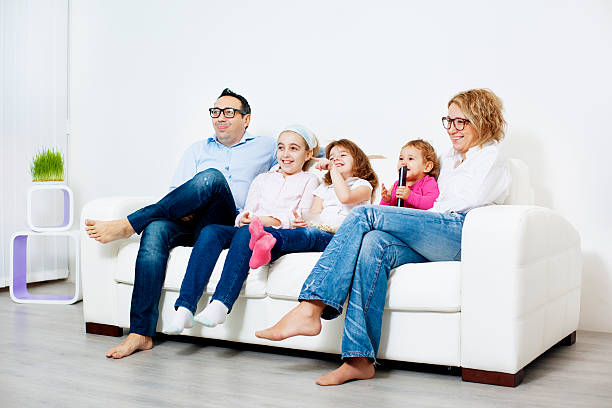 istock Family Watching TV at home. 155287189